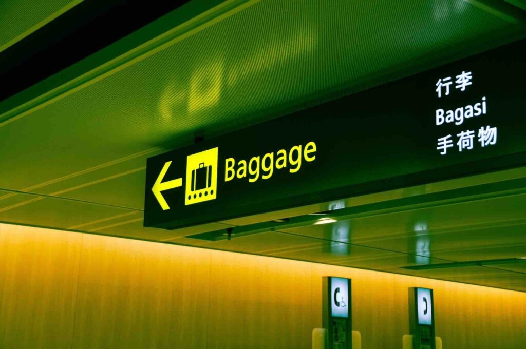 Close-up Photo of Baggage Sign